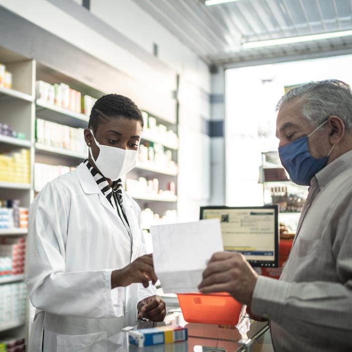 pharmacist talking to patient